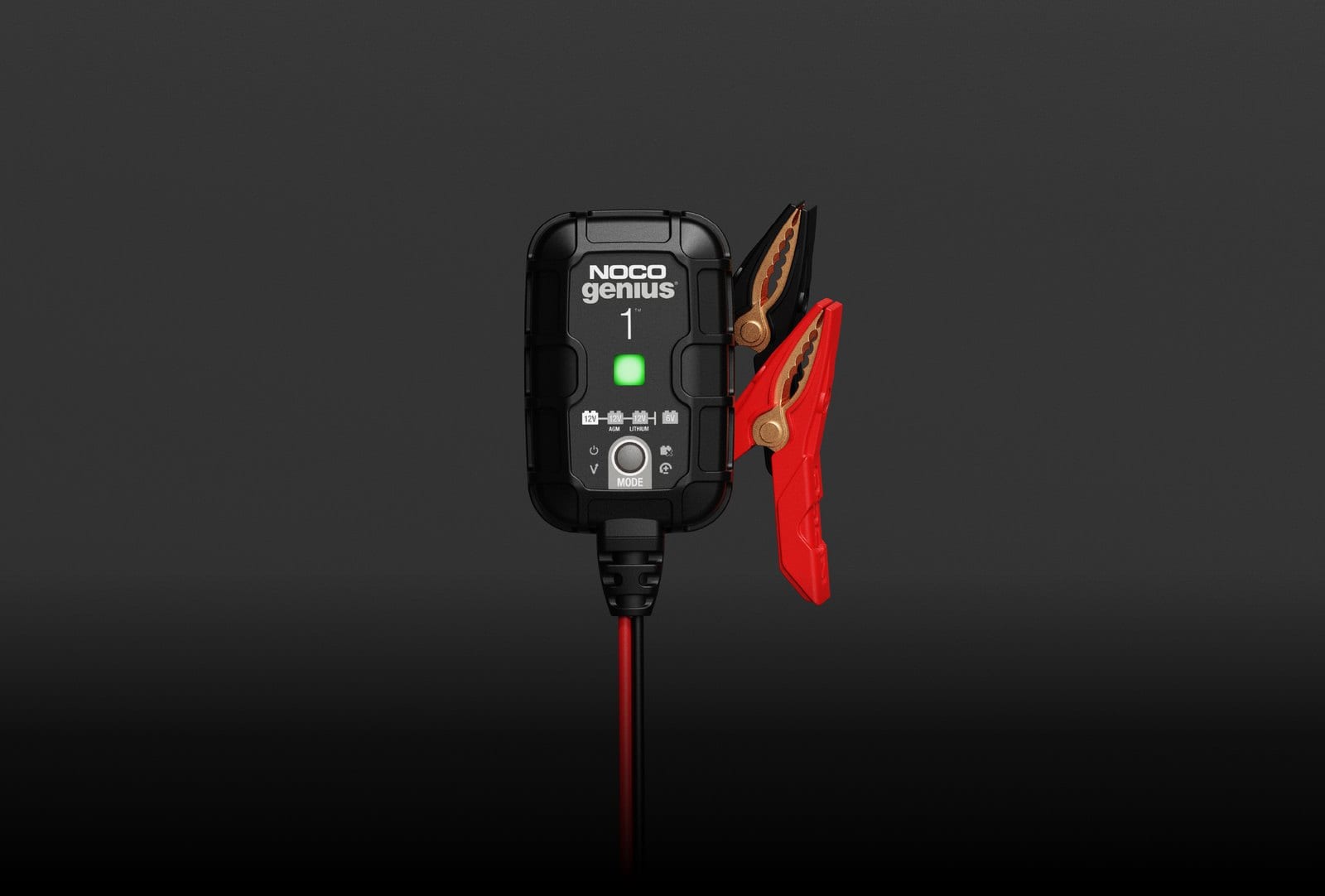 NOCO GENIUS1 1-amp smart battery charger with red and black battery clamps on a dark background
