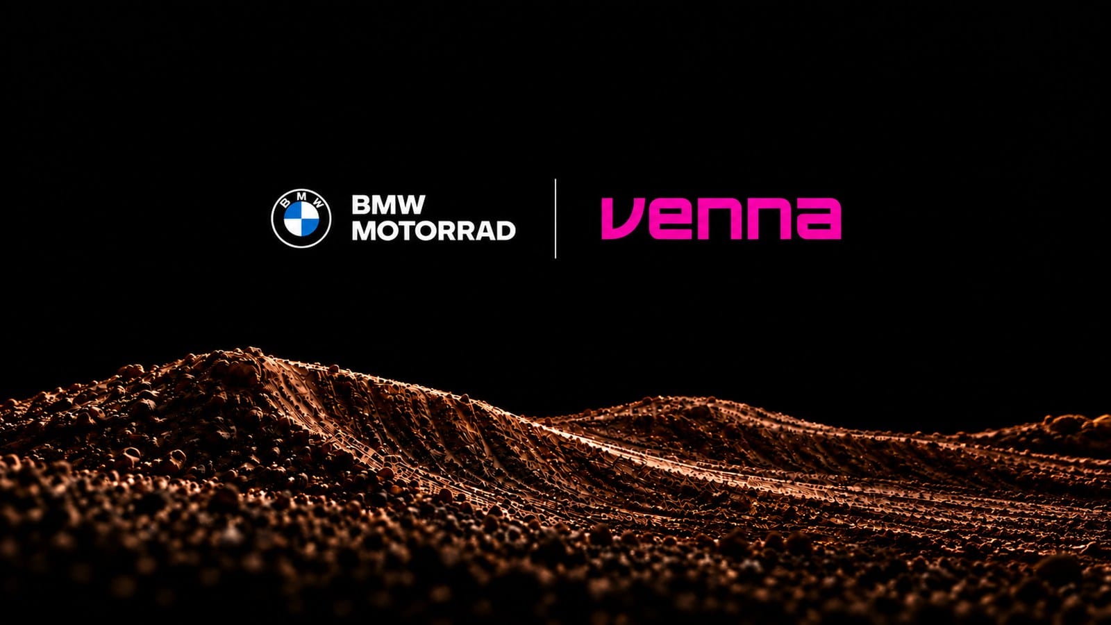 BMW roundel and white BMW Motorrad wordmark beside a pink Venna wordmark, separated by a thin vertical line, on a black background above a rippled field of brown dirt